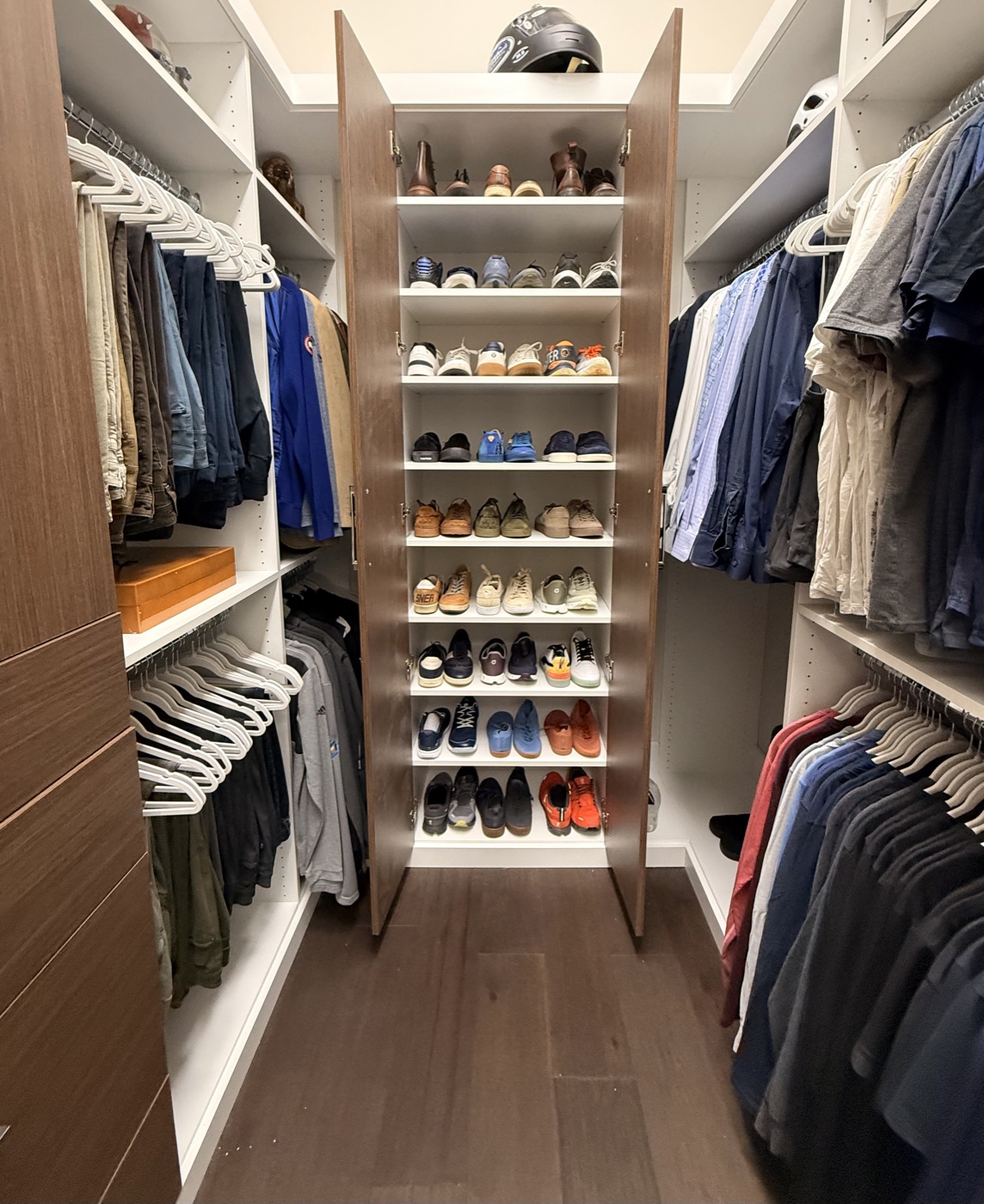 Men's walk-in closet transformation with full-height shoe tower