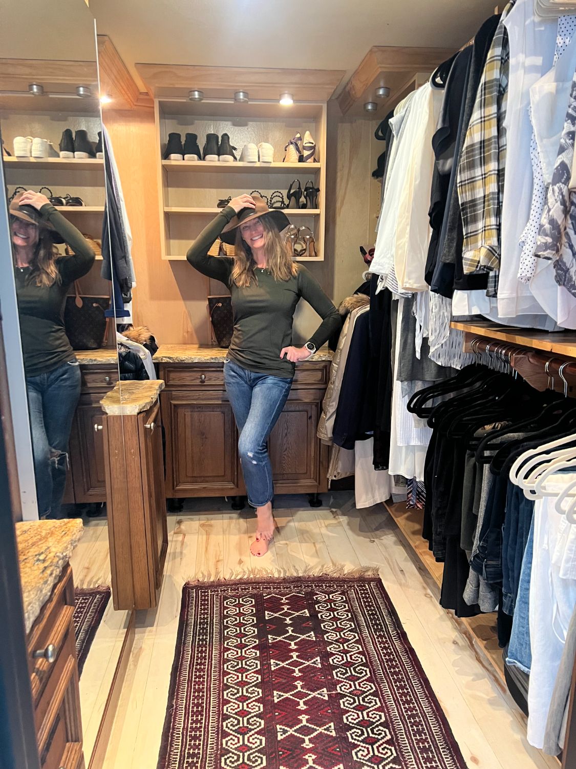 A happy client in her beautifully organized closet